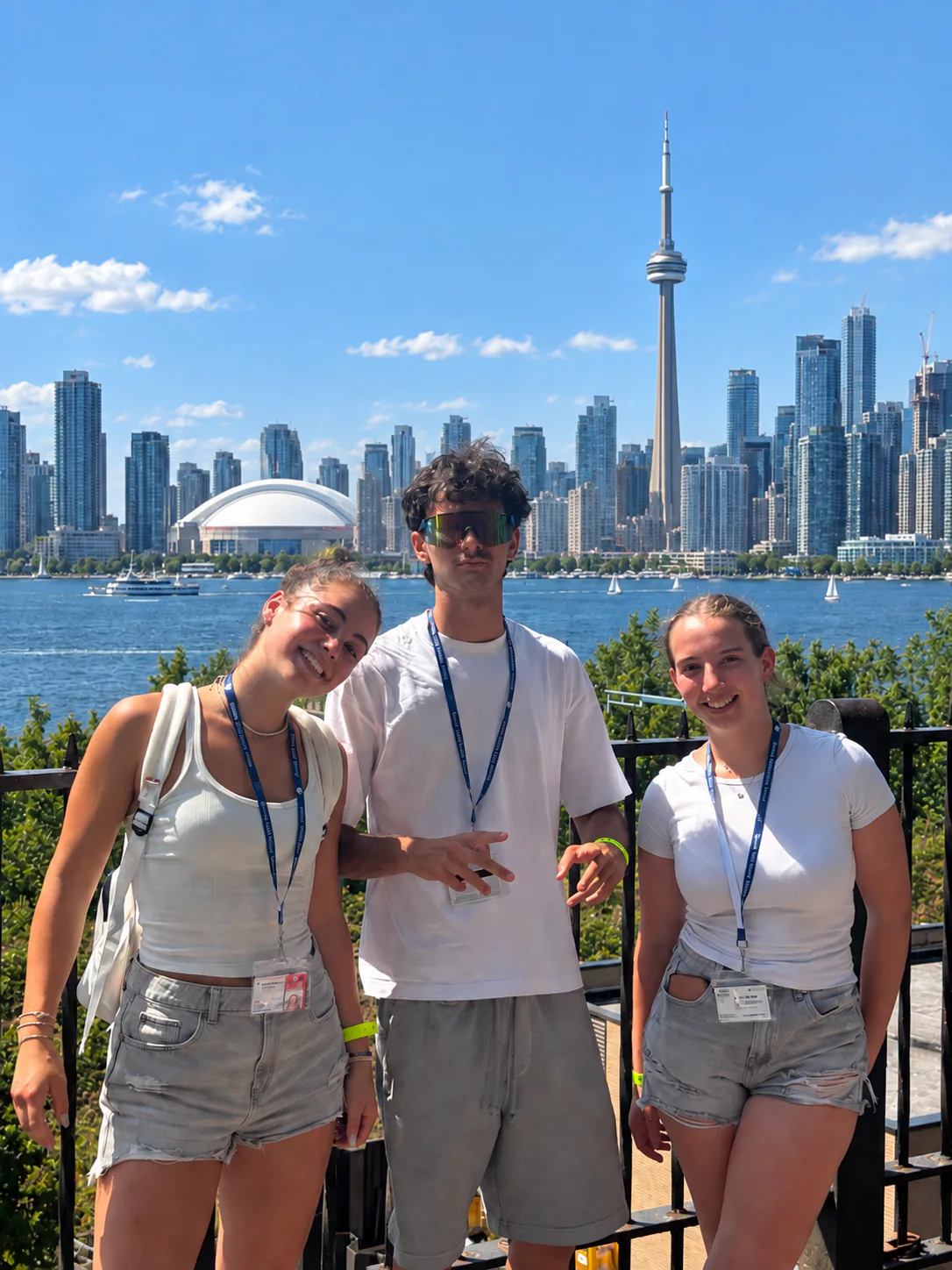 Students with the Toronto skyline and CN Tower